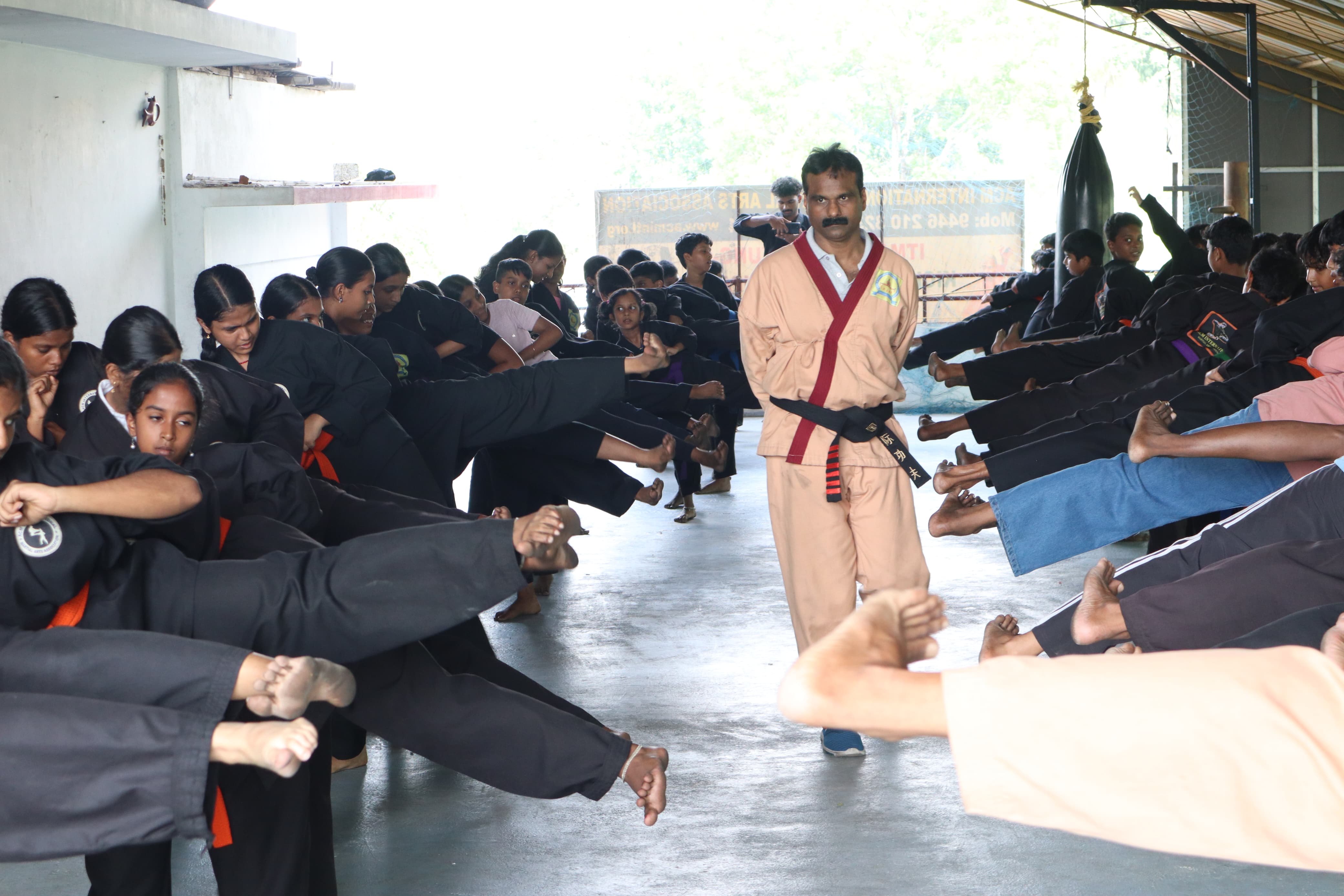 Martial arts athletes preparing for competition with intensive training and sparring drills