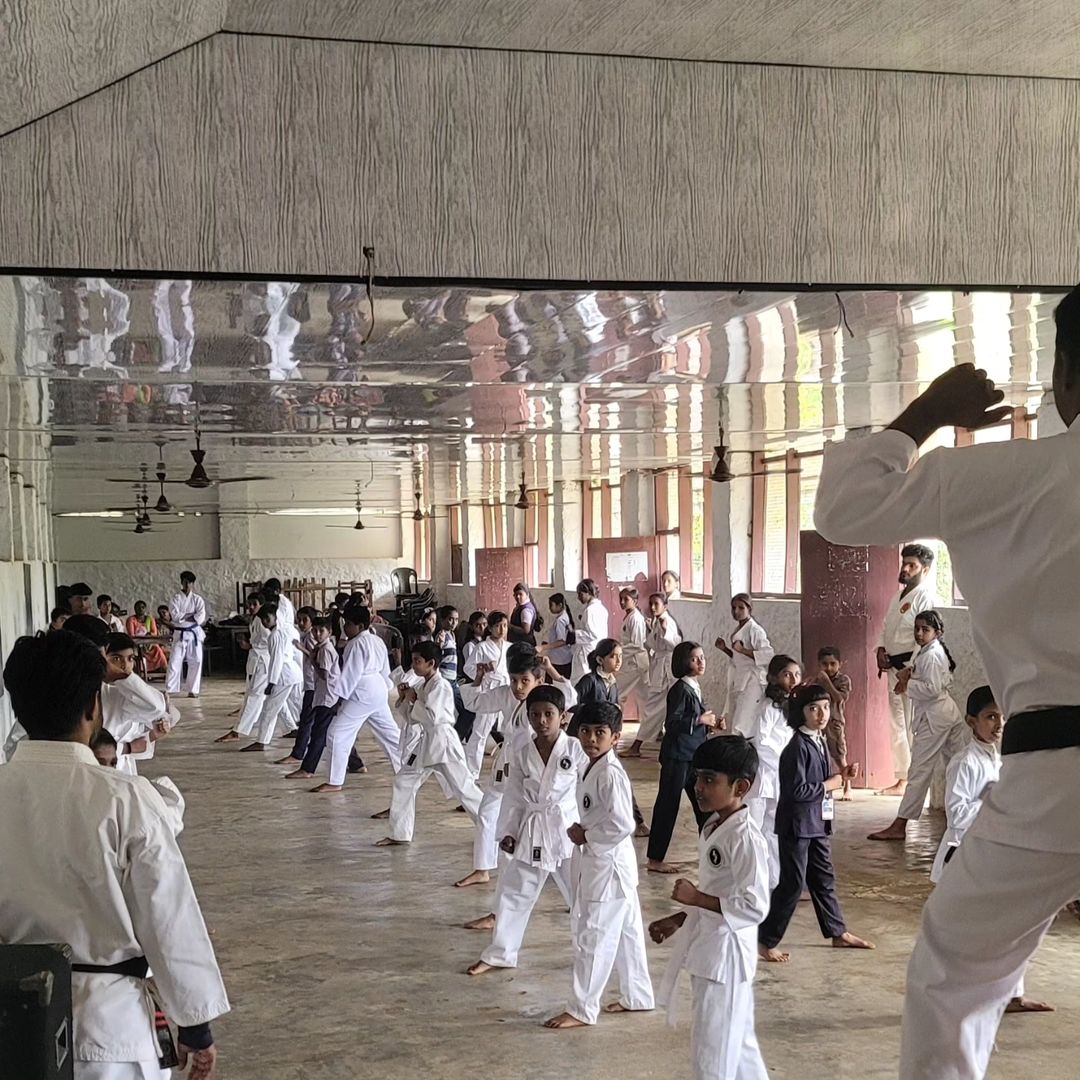 Professional martial arts instructor leading a detailed technique instruction session