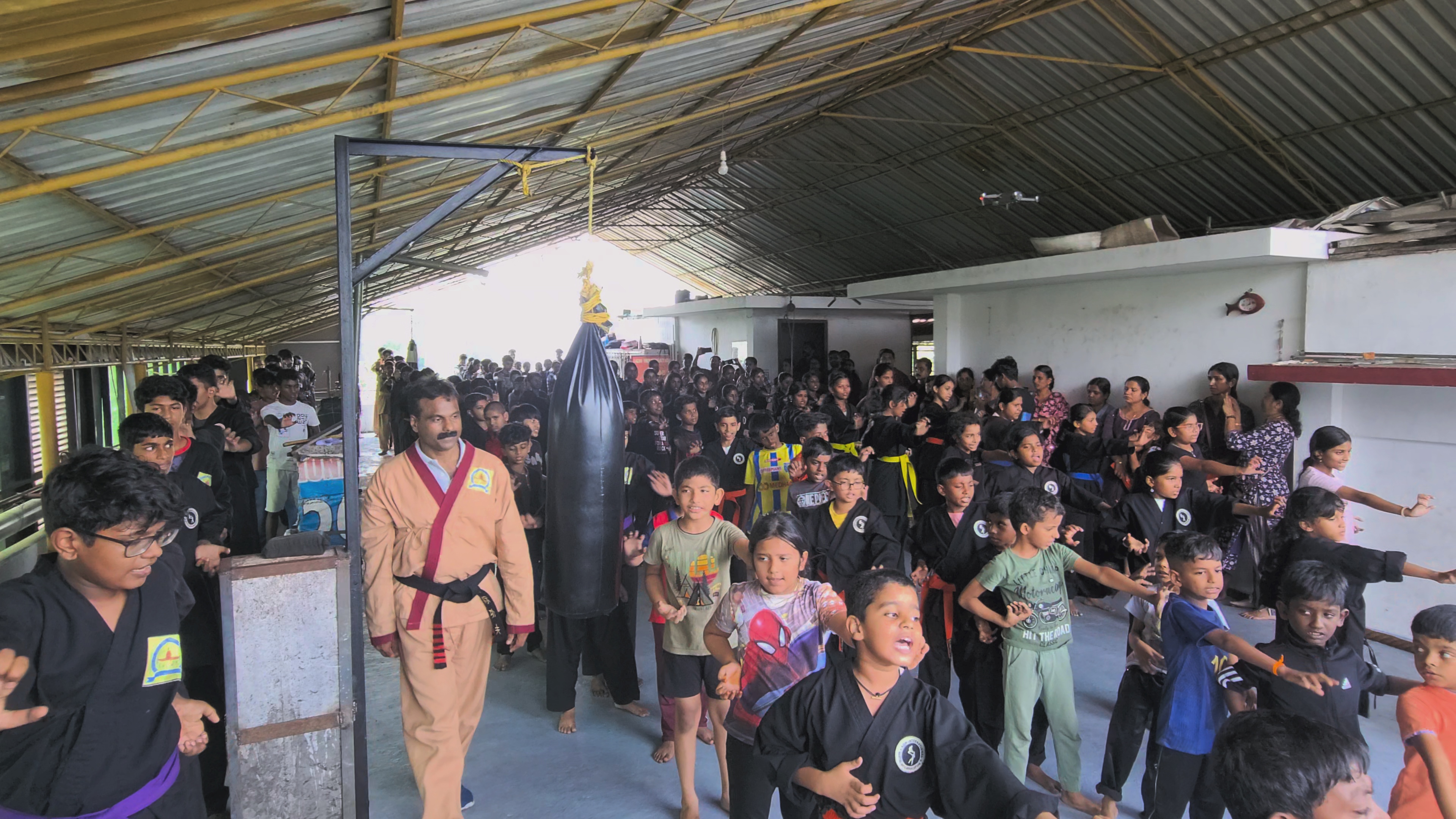 Triumphant martial arts champion celebrating victory moment at competition